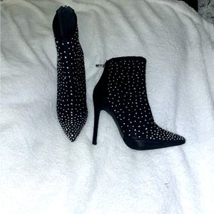 Sparkly black heeled booties